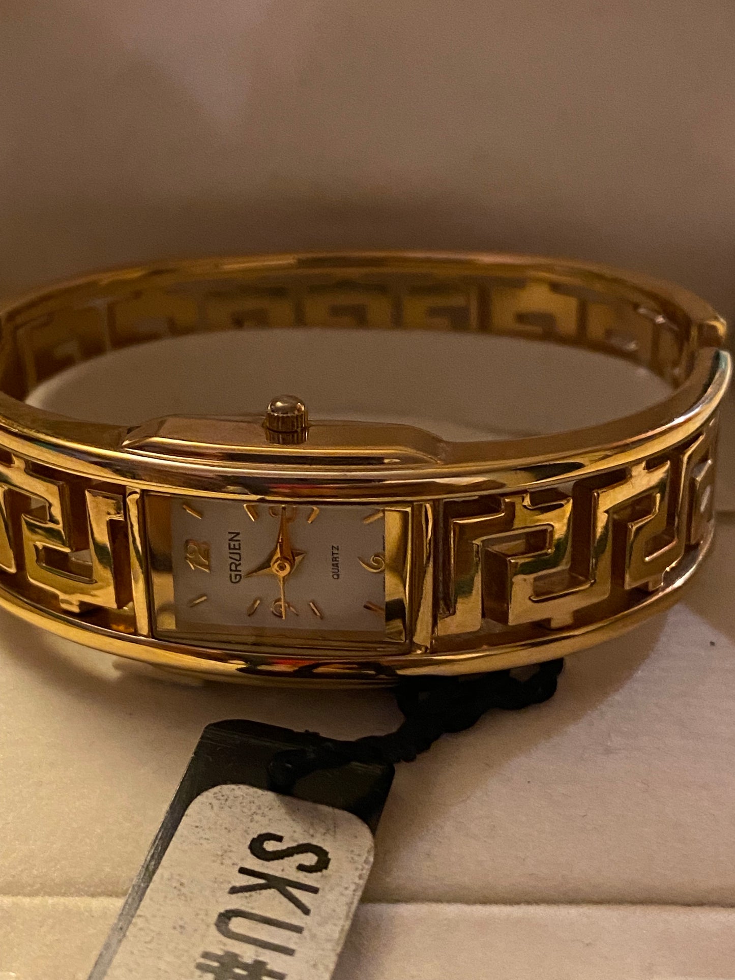 Gruen GR7985 Ladies Gold Tone Key Bangle Watch