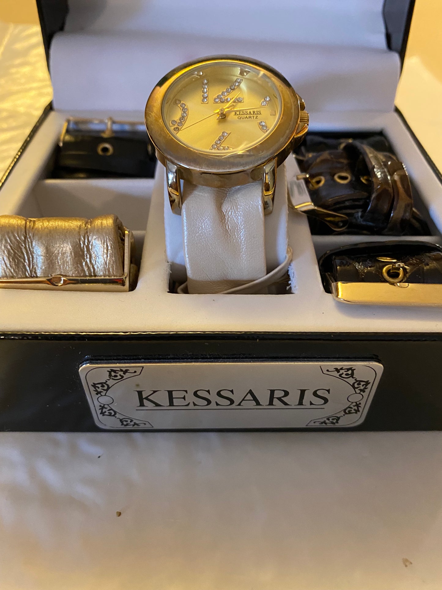 Ladies Kessaris Quartz Analog watch with Six (6) straps